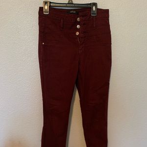 High-waisted maroon jeans